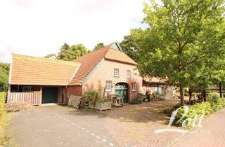 Bauernhaus kaufen in 26689 Apen, Ehemaliges Bauernhaus mit sanierter Wohnung und Ladenlokal (in der Diele) in Ortskernlage von Apen!