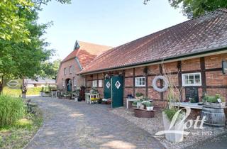 Bauernhaus kaufen in 26689 Apen, Landhaus mit sanierter Wohnung, Gewerbefläche & Ausbaupotenzial in bester Ortskernlage von Apen!