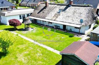 Haus kaufen in 24811 Owschlag, Norddeutscher Charme trifft Komfort: Zweifamilienhaus mit Bungalow- und Friesenhaus.