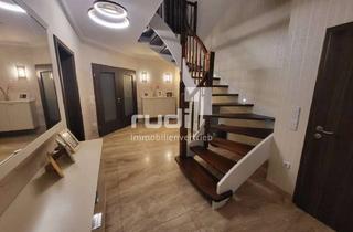 Villa kaufen in 33104 Paderborn, Moderne Stadtvilla mit hohen Decken im Wohnzimmer, Kamin, Erdwärmepumpe und eine geräumige Garage!