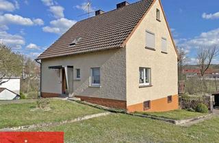 Haus kaufen in 36154 Hosenfeld, Wohnhaus mit großer Dachterrasse über der Doppelgarage und unverbaubarem Blick ins Grüne