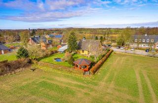 Einfamilienhaus kaufen in Esgrusschauby, 24402 Esgrus, Esgrus: Gepflegtes Einfamilienhaus in Feldrandlage auf sonnigem Grundstück, Garten, Kamin und Sauna