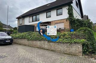 Haus kaufen in 56821 Ellenz-Poltersdorf, Großzügiges Einfamilienwohnhaus mit vermieteter Einliegerwohnung in toller Aussichtslage