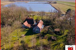 Haus kaufen in 26969 Butjadingen, Künstlerisch stilvoll umgebauter Reetdachtraum im Erholungsgebiet Butjadingen