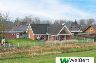 Einfamilienhaus kaufen in 25578 Neuenbrook, Neuenbrook - Idyllisches Landhaus in Neuenbrook - Wohntraum mit Weitblick und einzigartigem Ambiente