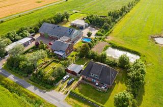 Haus kaufen in 25938 Midlum, Idyllisches Hofensemble 3 Ferienwohnungen,Nebengebäude und traumhafter Garten in Föhrer Marsch