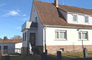 Doppelhaushälfte kaufen in 36381 Schlüchtern, Schlüchtern - **Charmantes Ein-Zwei-Familienhaus (DHH) in Ortsrandlage**