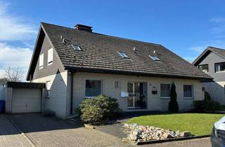 Haus kaufen in 46348 Raesfeld, Geschmackvolles Zweifamilienhaus mit großem Garten und zwei Garagen in ländlicher Wohnlage!