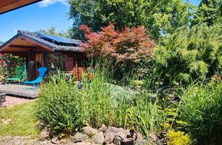 Wohnung kaufen in 59759 Arnsberg, Arnsberg - Wohnung mit Garten und ausgebautem Dachboden