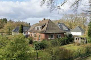 Mehrfamilienhaus kaufen in 27404 Heeslingen, Ideale Kapitalanlage! Mehrfamilienhaus mit 3 Wohneinheiten & viel Platz!