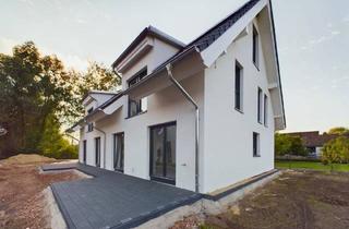 Doppelhaushälfte kaufen in 31535 Neustadt, Neustadt am Rübenberge - Effizient wohnen: KfW40 Neubau DHH im Grünen