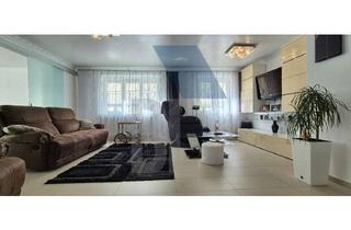 Wohnung kaufen in 75177 Nordstadt, Von zwei zu einem: Großzügige 3,5-Zimmer-Wohnung mit Wintergarten und Gartenparadies