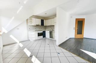 Wohnung kaufen in 72290 Loßburg, Sonnige Dachgeschoss-Wohnung mit Tiefgaragenplatz