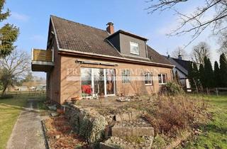 Einfamilienhaus kaufen in 24628 Hartenholm, Hartenholm - Teilvermietetes Einfamilienhaus mit Einliegerwohnung in schöner Lage von Hartenholm