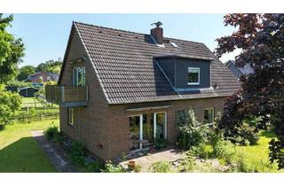 Einfamilienhaus kaufen in 24628 Hartenholm, Hartenholm - Teilvermietetes Einfamilienhaus mit Einliegerwohnung in schöner Lage von Hartenholm