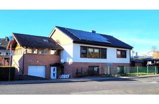 Haus kaufen in 35625 Hüttenberg, Hüttenberg - Zweifamilienhaus mit Wintergarten, Garage, gr.Garten und Carport
