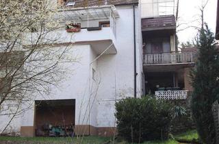 Doppelhaushälfte kaufen in 67722 Winnweiler, Winnweiler - Zweifamilienhaus mit Entwicklungspotenzial und Gartenfläche zur kreativen Neugestaltung