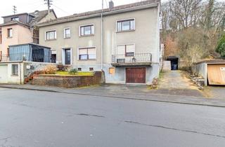 Mehrfamilienhaus kaufen in Burgstraße 70, 57518 Betzdorf, Solide Kapitalanlage: Mehrfamilienhaus mit 4 Wohneinheiten, Garagen und Garten!