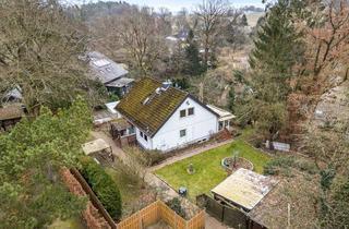 Einfamilienhaus kaufen in Am Spritzenhaus, 21271 Asendorf, Charmantes Einfamilienhaus mit vermieteter Kellereinheit auf herrlichem Grundstück
