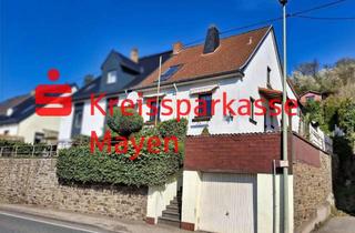 Doppelhaushälfte kaufen in 56659 Burgbrohl, Charmante Doppelhaushälfte mit Weitblick, Garten und Garage