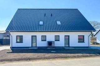 Doppelhaushälfte kaufen in 24644 Timmaspe, Neubau Doppelhaushälfte Erstbezug!