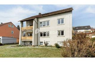 Mehrfamilienhaus kaufen in 97337 Dettelbach, Dettelbach - Attraktives Mehrfamilienhaus mit 3 Wohneinheiten, Garten und Garagen in Dettelbach