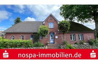 Einfamilienhaus kaufen in 25938 Oevenum, Einfamilienhaus mit Einliegerwohnung und Carport im Herzen von Oevenum