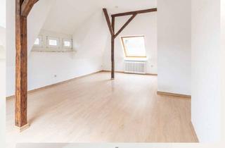 Wohnung kaufen in 26721 Stadtzentrum, Lichtdurchflutete Dachgeschosswohnung mit Flair in zentraler Lage!