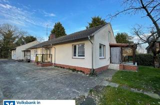 Haus kaufen in 31629 Estorf, Zweifamilienhaus mit Nebengebäuden auf herrlichem Grundstück