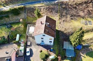 Haus kaufen in 65388 Schlangenbad, Schlangenbad-Niedergladbach: Ein 2-Familienhaus in Waldrandlage mit Potential!