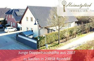 Doppelhaushälfte kaufen in 23858 Reinfeld, Neuwertige Doppelhaushälfte in verkehrsberuhigter Lage von Reinfeld