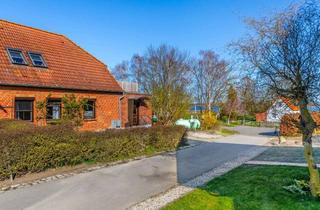 Haus kaufen in Am Breitling 40, 23999 Insel Poel, Charmantes Reihenendhaus auf Insel Poel – Ostseenähe, Naturidylle & 2 Wohnungen, mit Balkon & Garten