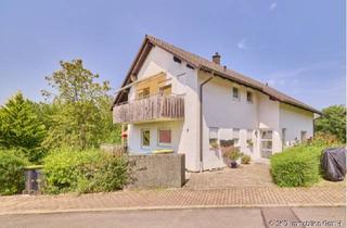 Mehrfamilienhaus kaufen in Am Roten Rain 25, 74869 Schwarzach, Investitionsmöglichkeit in Top-Lage: Gepflegtes Dreifamilienhaus in Schwarzach