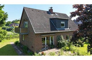 Einfamilienhaus kaufen in Hasselbusch, 24628 Hartenholm, Teilvermietetes Einfamilienhaus mit Einliegerwohnung in schöner Lage von Hartenholm