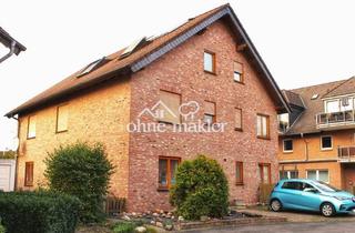 Mehrfamilienhaus kaufen in Hessenweg 17, 50389 Wesseling, Vollvermietetes Freistehendes Mehrfamilienhaus in Wesseling mit großem Garten und Garage