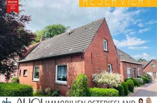 Einfamilienhaus kaufen in 26736 Krummhörn, Haus mit Potential! Sanierungsbedürftiges Einfamilienhaus mit kleinem Garten in malerischer Lage
