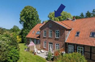 Wohnung kaufen in 23738 Manhagen, Charmante Maisonettewohnung in historischem Herrenhaus – Wohnen mit Charakter und Komfort