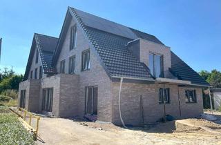 Wohnung kaufen in 48356 Nordwalde, Wohnvergnügen satt! Moderne Erdgeschosswohnung im Doppelhaus in Nordwalde