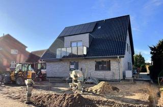 Wohnung kaufen in 48356 Nordwalde, Wohnvergnügen satt! Moderne Erdgeschosswohnung im Doppelhaus in Nordwalde