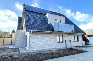 Wohnung kaufen in 48356 Nordwalde, Wohnvergnügen satt! Moderne Erdgeschosswohnung im Doppelhaus in Nordwalde