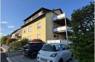 Wohnung kaufen in 35463 Fernwald, Modernisierte Eigentumswohnung mit Balkon und Stellplätzen in Fernwald!
