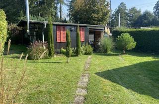 Grundstück zu kaufen in 61250 Usingen, Schöner Wochenendplatz mit Holzhaus "Katharinenhof am Hattsteinweiher"