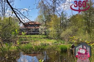 Villa kaufen in 14532 Stahnsdorf, Stilvolles Architektenhaus im fernöstlichen Stil mit Gartenhaus & Weiher: IDYLLE. DISKRET. EXKLUSIV.