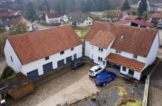 Mehrfamilienhaus kaufen in 36318 Schwalmtal, Kapitalanlage mit 7 % Rendite – Modernisiertes Mehrfamilienhaus mit zusätzlichem Nutzgebäude