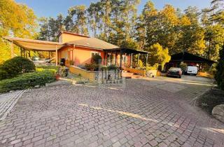 Einfamilienhaus kaufen in 15518 Briesen, Briesen - Majestätisches - 4.100 m² traumhaftes GST - Bungalow inkl. Pool, Sauna, Carport & Gästehaus am See !