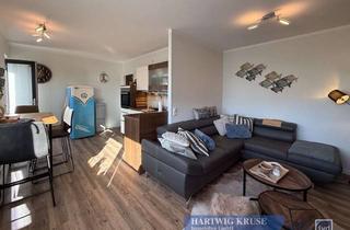 Wohnung kaufen in 23775 Großenbrode, Strandnah genießen: Möblierte Ferienoase mit Terrasse und Meeresrauschen