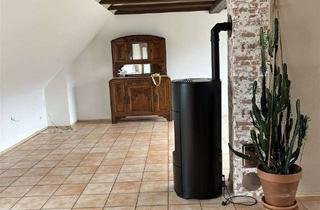 Wohnung kaufen in 76532 Weststadt, Hoch über den Dächern – Charmante Dachgeschosswohnung mit Komfort und Weitblick im Grünen