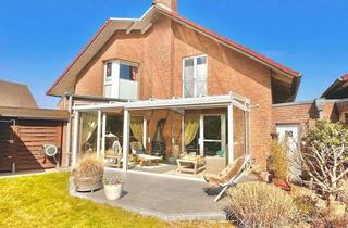 Haus kaufen in 23923 Selmsdorf, Architektonisches Wohnhighlight mit Wintergarten, Vollkeller und Platz für die ganze Familie
