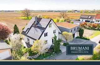 Einfamilienhaus kaufen in Eisenbahnstr. 17, 79426 Buggingen, BRUMANI | Großzügiges Einfamilienhaus mit exklusiven Anbau, großem Garten und Pool in Buggingen