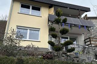 Einfamilienhaus kaufen in 56651 Niederzissen, Vermietetes, geräumiges Einfamilienhaus mit Garge in Niederzissen.